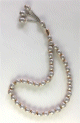 Chapelet "Sebha" de luxe a 33 grains couleur blanc motif lignes brisees dorees