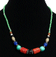 Collier ethnique artisanal imitation pierres multiformes agrementees de perles multicolores
