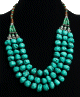 Collier ethnique artisanal imitation pierres turquoises et perles agence de pieces argentees ciselees
